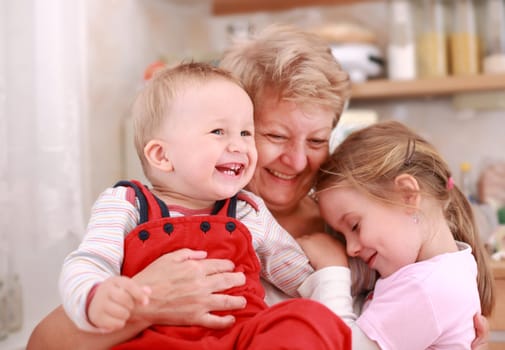 Happy children with granny