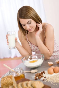 Baking -  woman with healthy ingredient