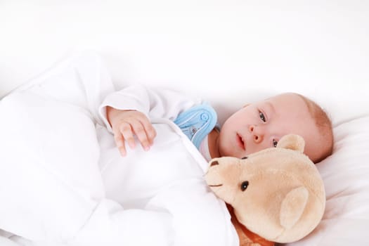 Adorable newborn in bed