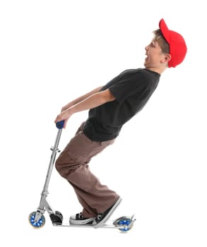 Child plays on a scooter