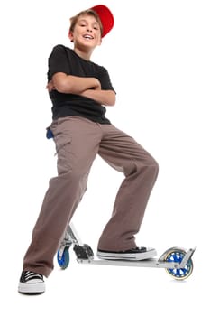 Boy sitting handlebars scooter