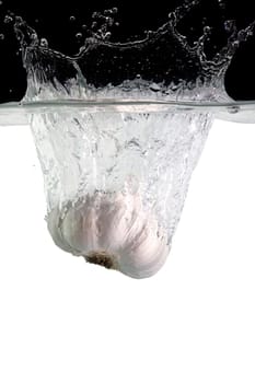 Garlic bulb in water