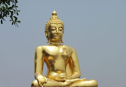 The Buddha stands at the Golden Triangle,in Thailand