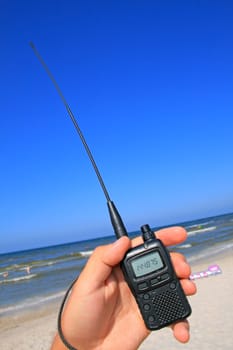 Walkie talkie in a hand
