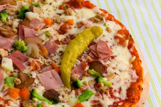 Pizza Supreme with mozzarella,broccoli