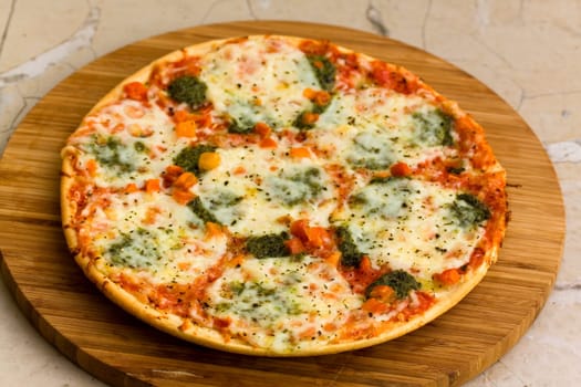 Pizza Supreme with mozzarella,broccoli