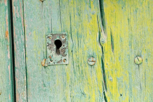 Lock on a green door