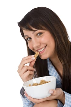 Smiling woman eat healthy cereal for breakfast
