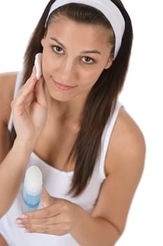 Beauty facial care - Teenager woman cleaning acne skin