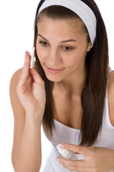Beauty facial care - Teenager woman cleaning acne skin