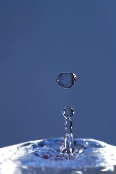 spout and falling drop