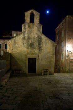 Moon over old church