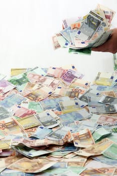 A large quantity of bank notes in the background