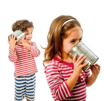 two kids talking on a tin phone