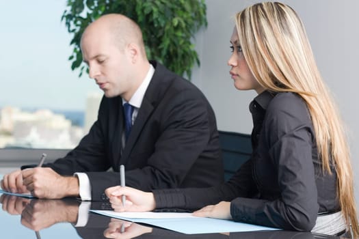 Businessman with asian assistant