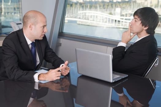 Conversation between two businessmen