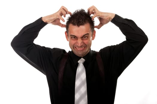 Angry businessman tearing his hair