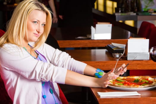 Young Woman Eating Dinner