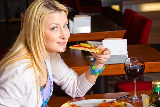 Young Woman Eating Dinner