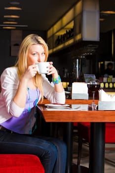 Young Woman Eating Dinner