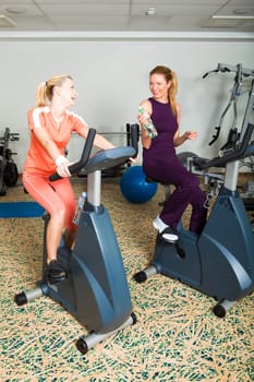 Two Young Women in Gym