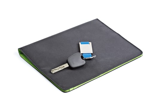 Car key and black folder