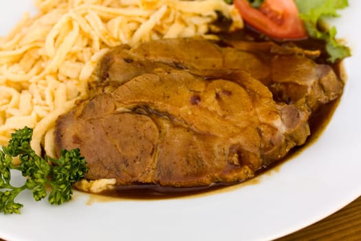 Roast pork with malt sauce and spaetzle