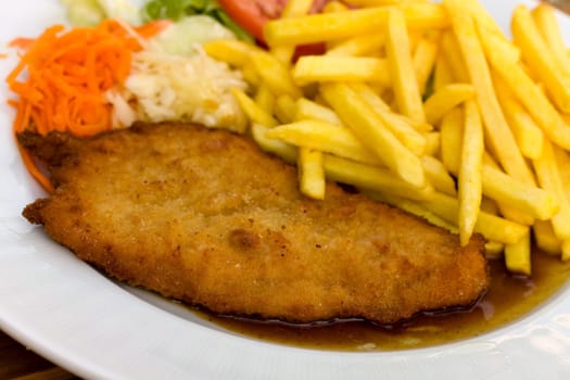Breaded schnitzel with french fries