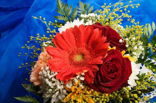 bunch of flowers on blue