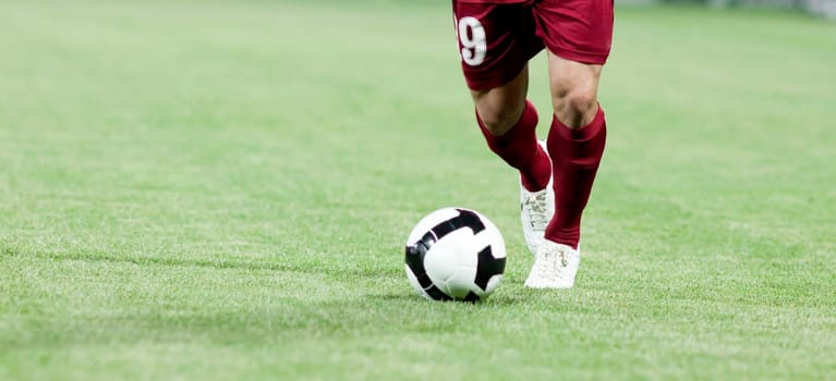 Soccer players fighting for the ball