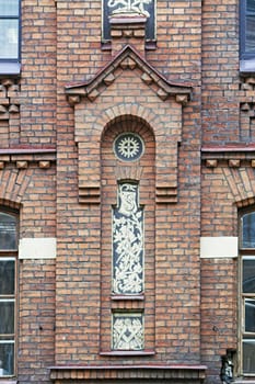 Ornamented Brick Facade of Old Building
