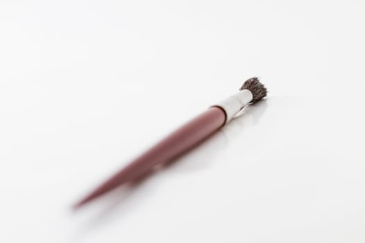 Brush backwards