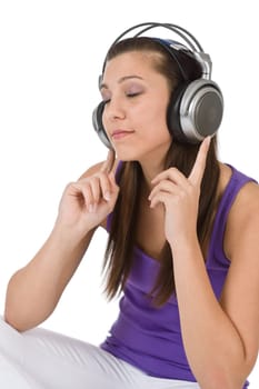Happy teenager woman enjoy music with headphones