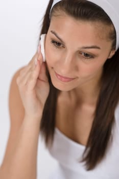 Beauty facial care - Teenager woman cleaning acne skin