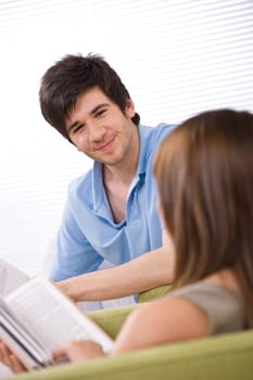 Student - two teenager reading book home