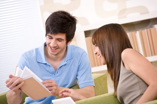 Student - two teenager reading book home