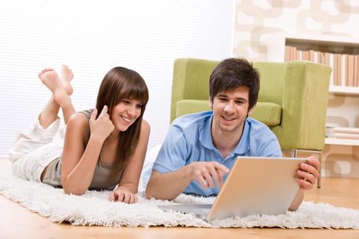 Student - two teenager with laptop in living room