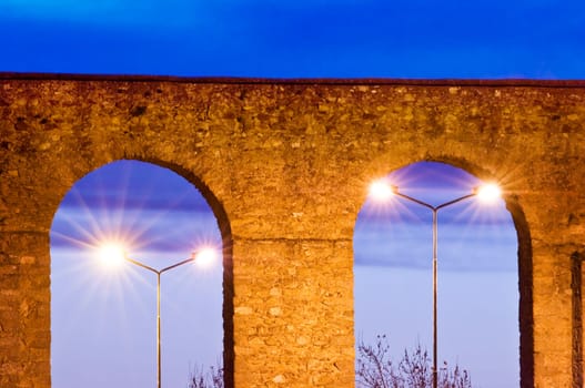 Evora aqueduct by night