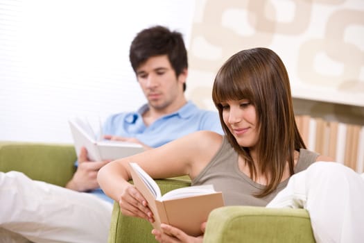Student - two teenager reading book home