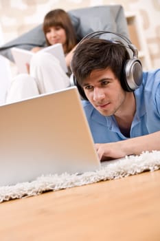 Student - Two teenager with laptop and headphones
