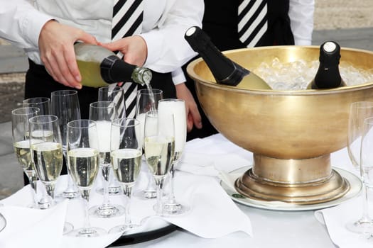 Waitress served champagne in a champagne reception