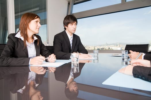 Businessman with assistant laughing