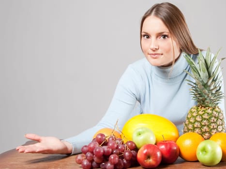 woman with red grapes
