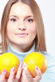 woman with red grapes