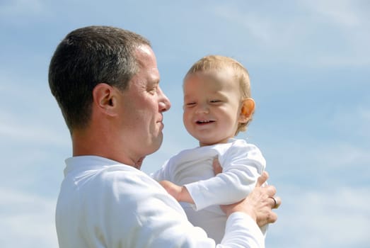 Proud Father -Holding Child-