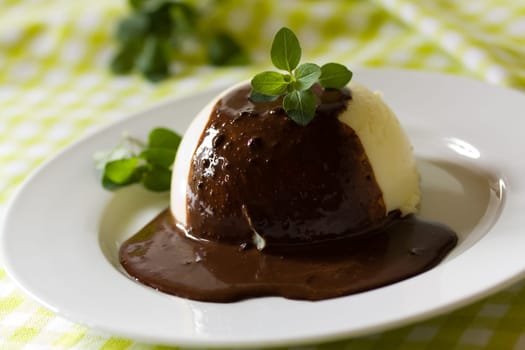 Vanilla pudding with chocolate sauce