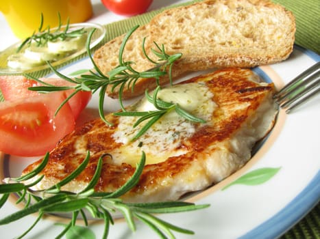 Chicken fillet steak with rosemary butter