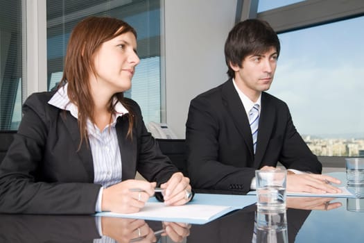 Businessman with assistant laughing