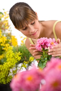 Gardening - portrait of woman with flower