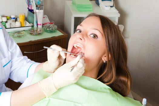 young woman patient at dentist